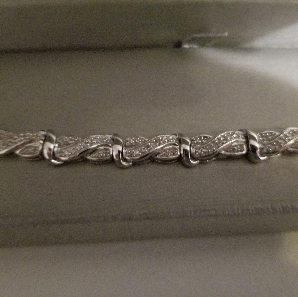 1 ct. diamond swirl line bracelet from zales.